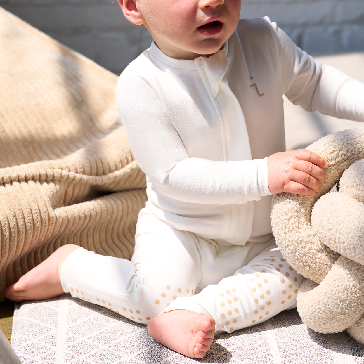 grip baby onesie milky